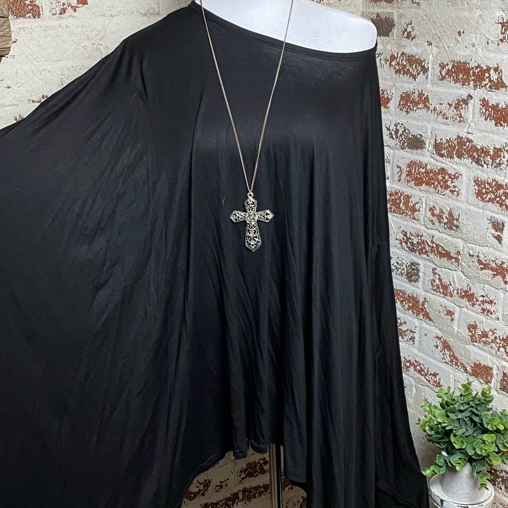 Black poncho style with arm holes